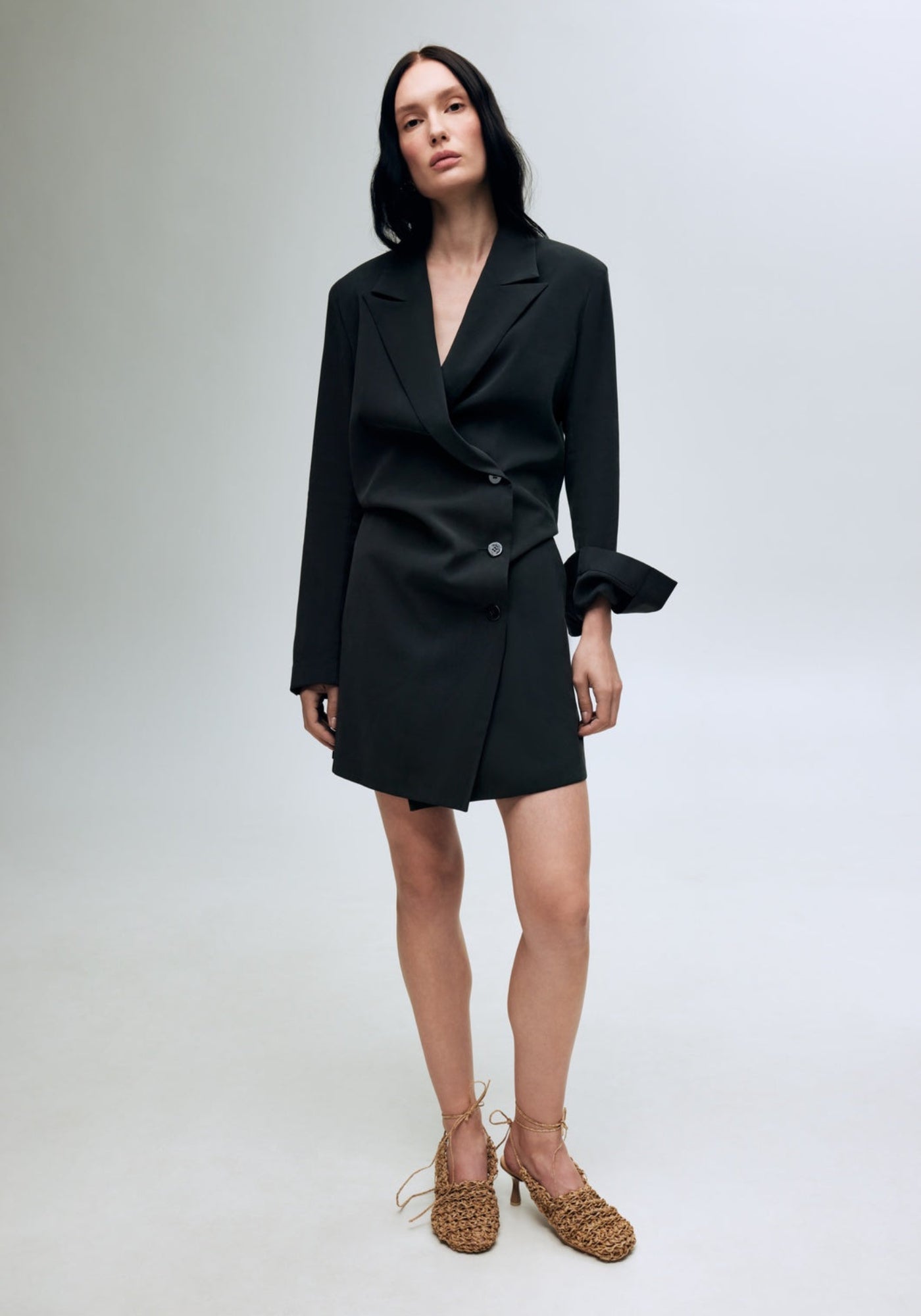 Black jacket dress with a back slit
