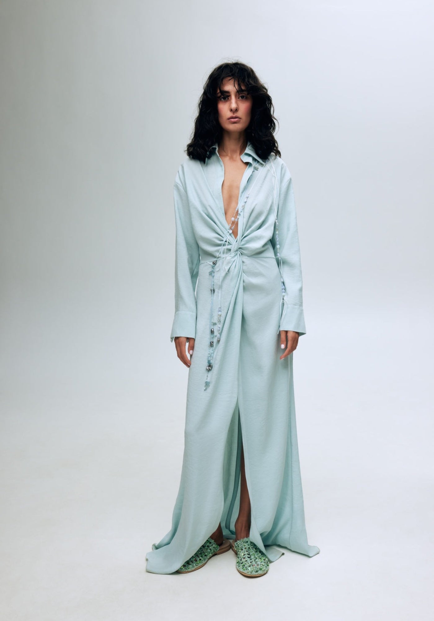 Turquoise shirt dress with a twist