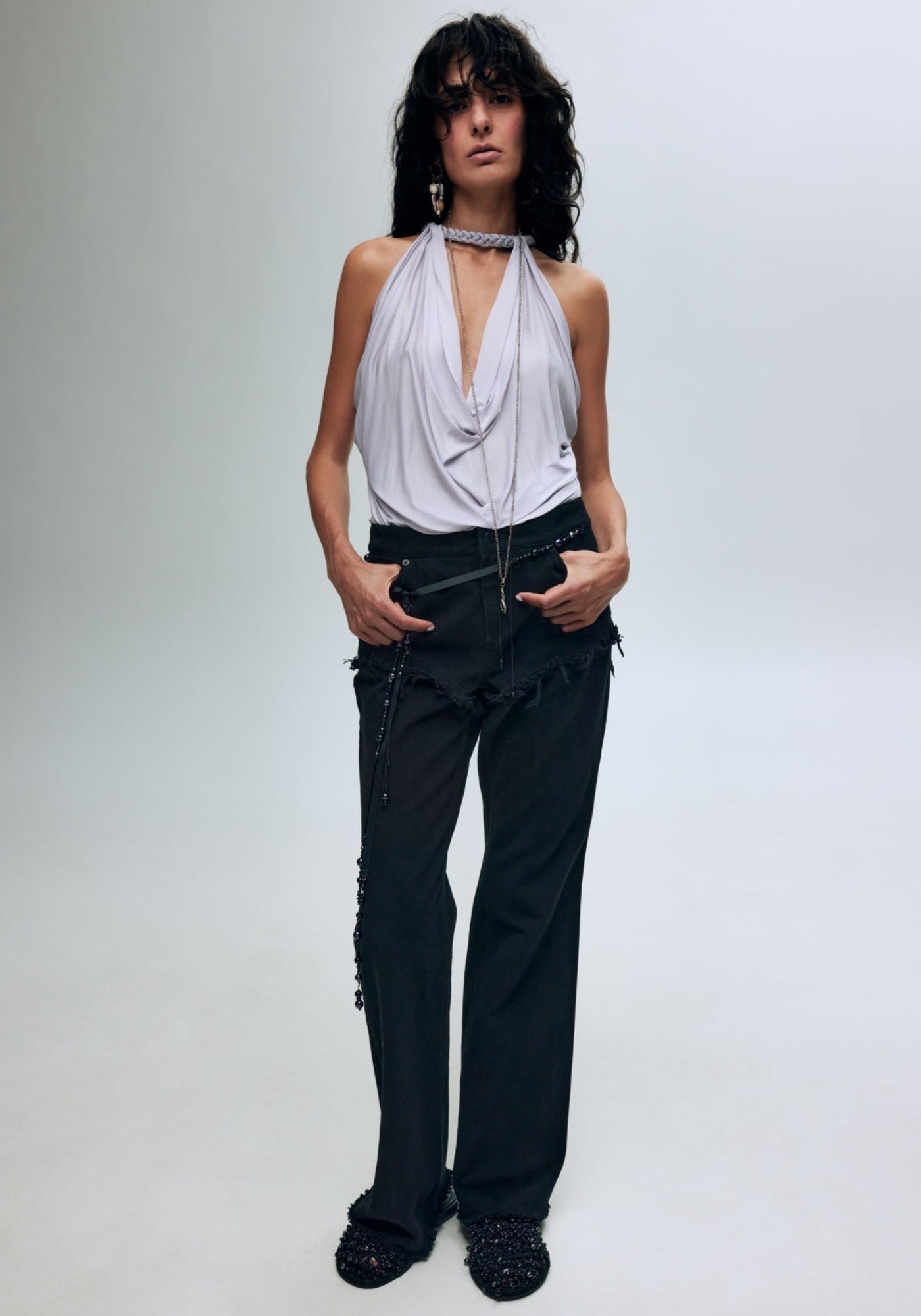 Black jeans with lingerie-like details