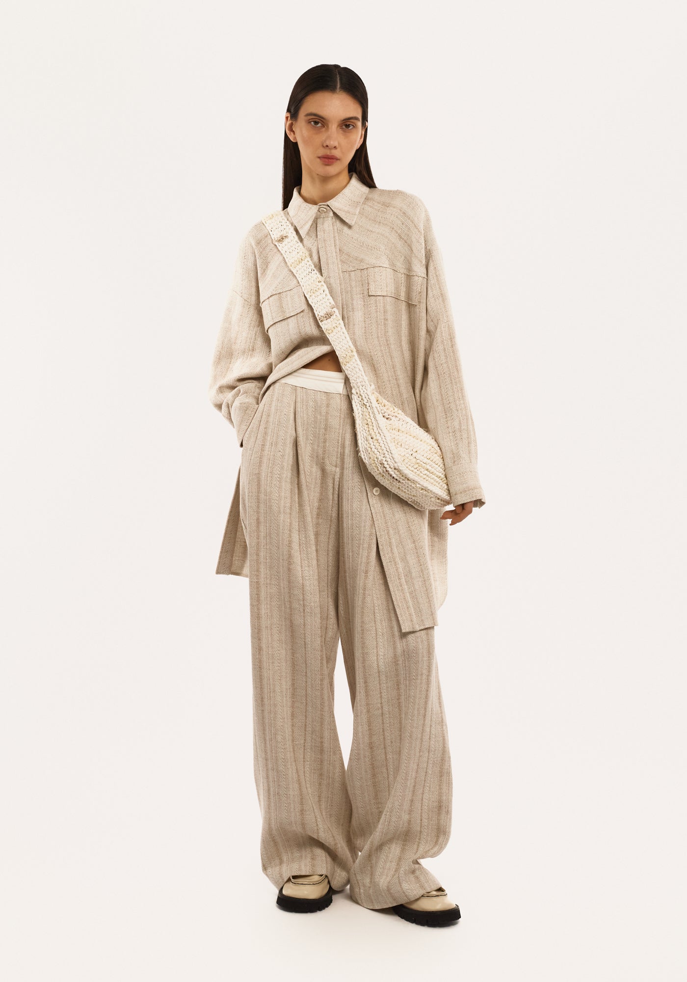 Grey-beige pants on the corsage belt