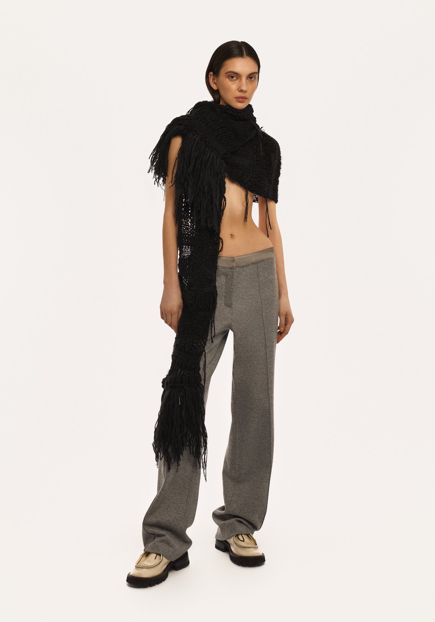 Grey knitted wool pants with a silk belt