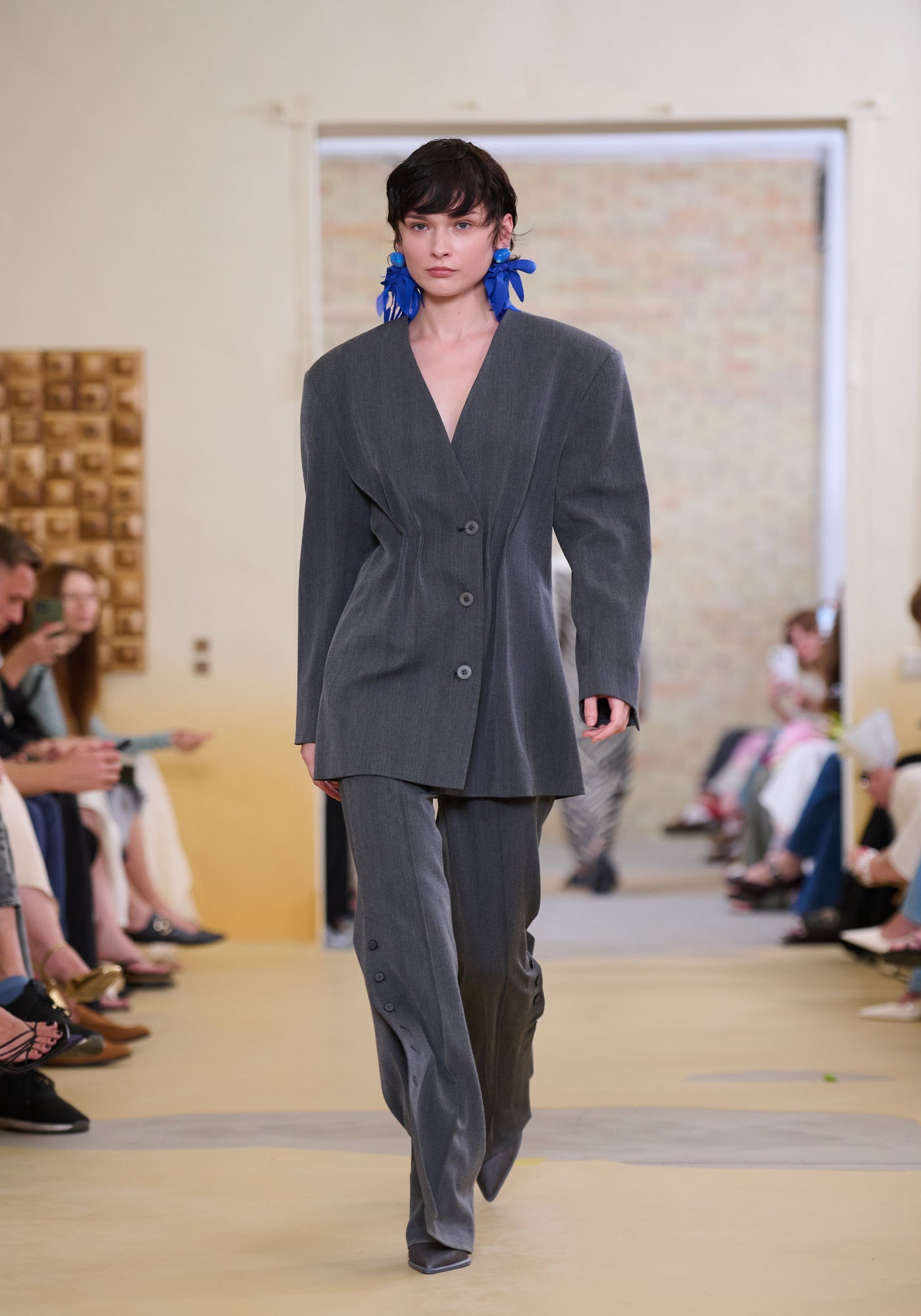 Dark-grey flared pants with slits