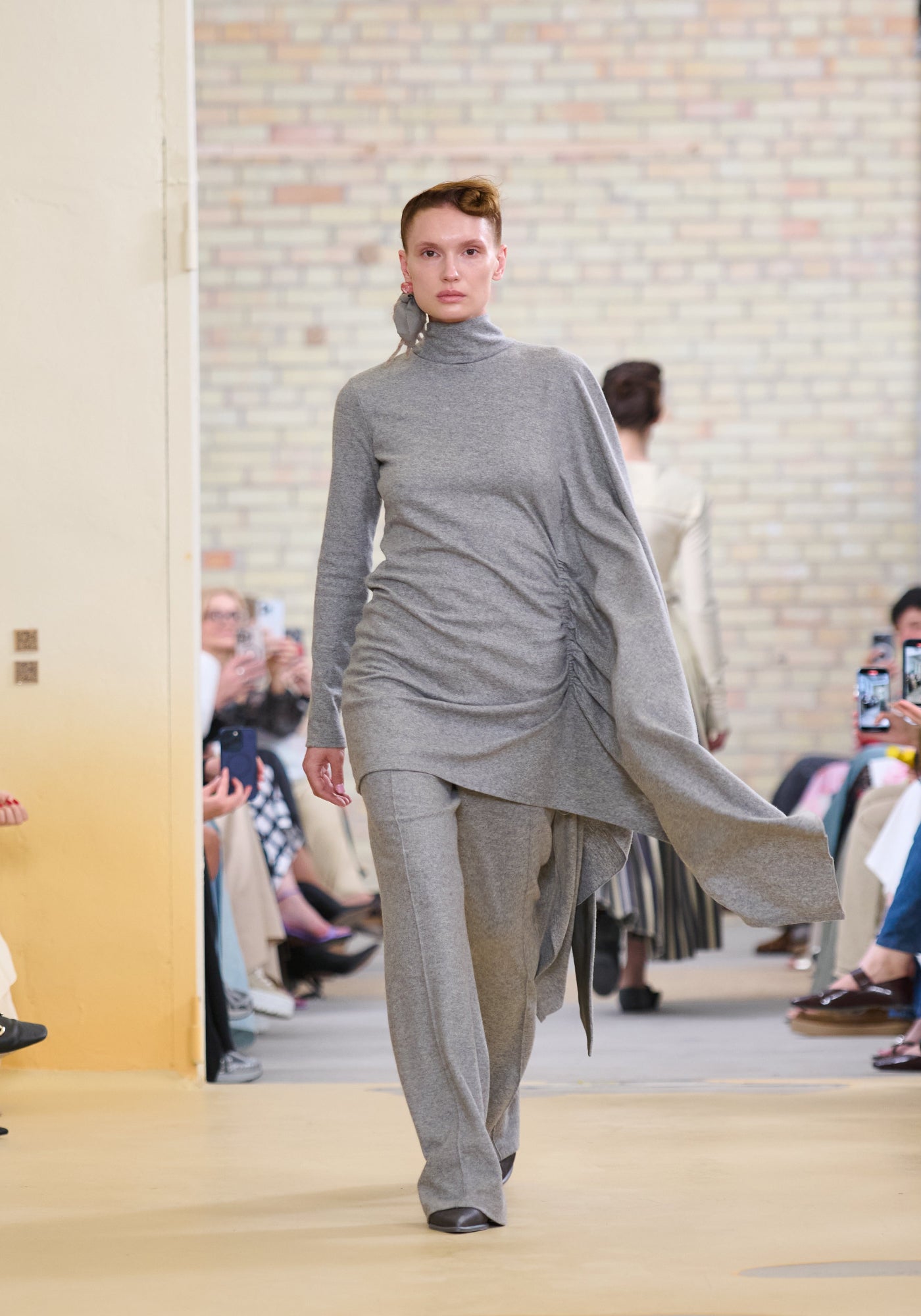 Grey knitted wool pants with a silk belt