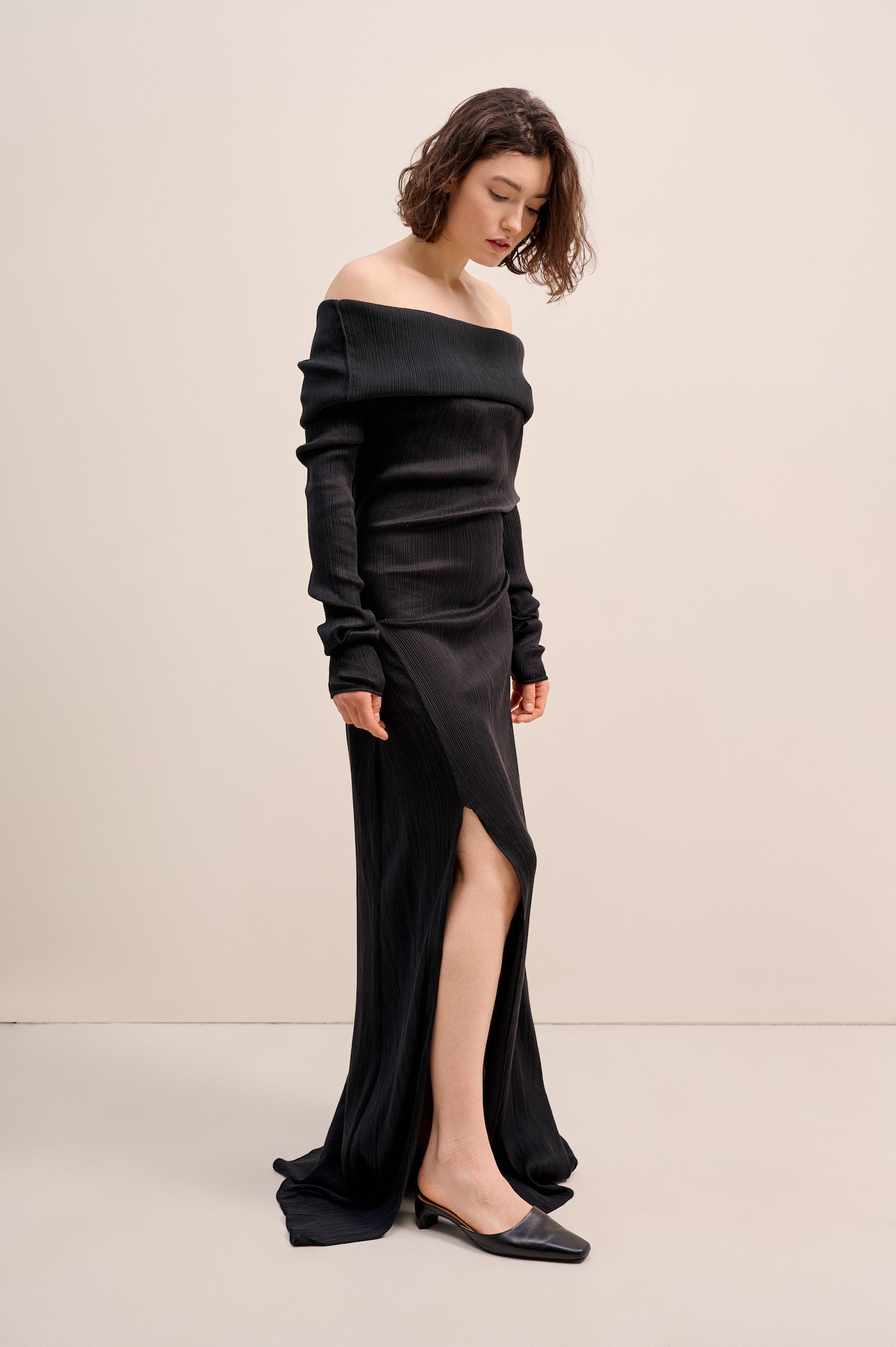 Black silk dress with bare shoulders