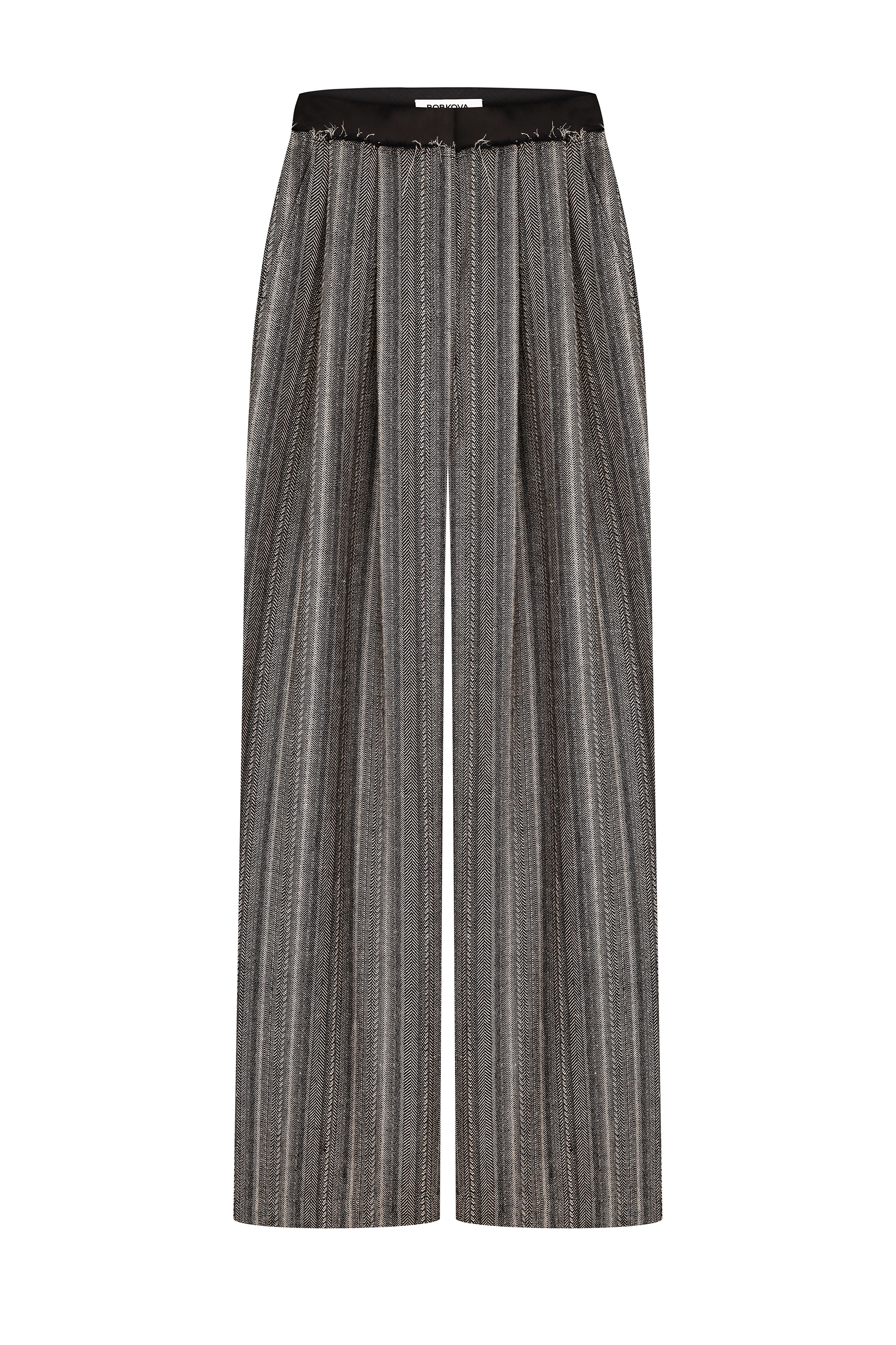 Black and beige trousers on a corsage belt