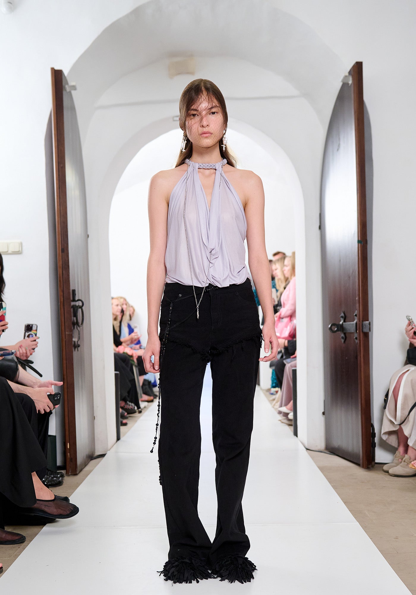 Black jeans with lingerie-like details