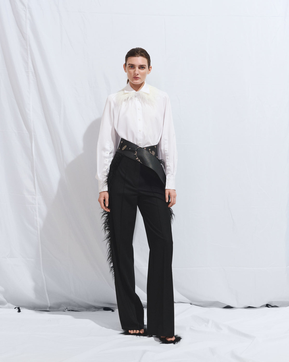 Black wool pants with fur finishing