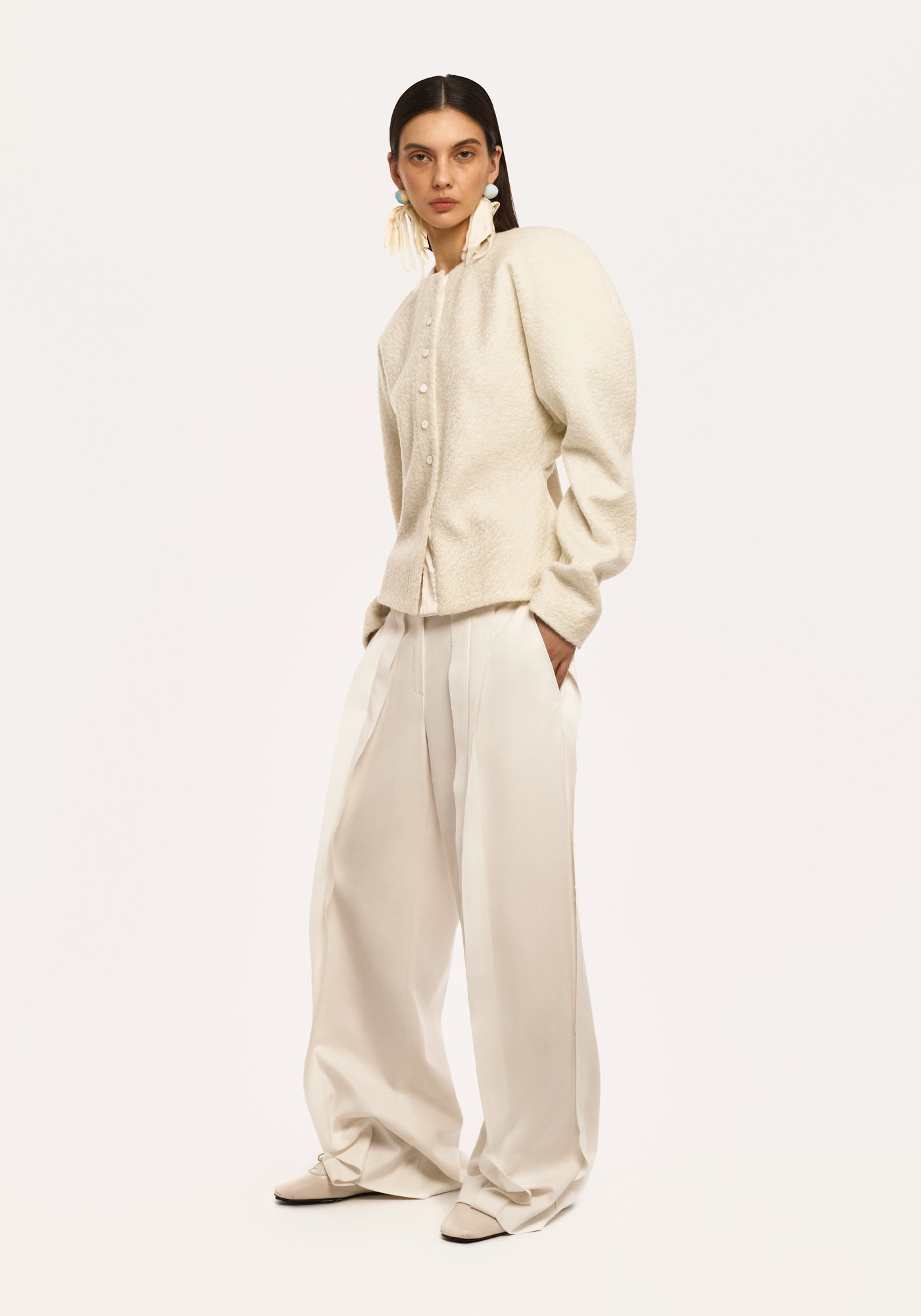 White trousers with raw seams
