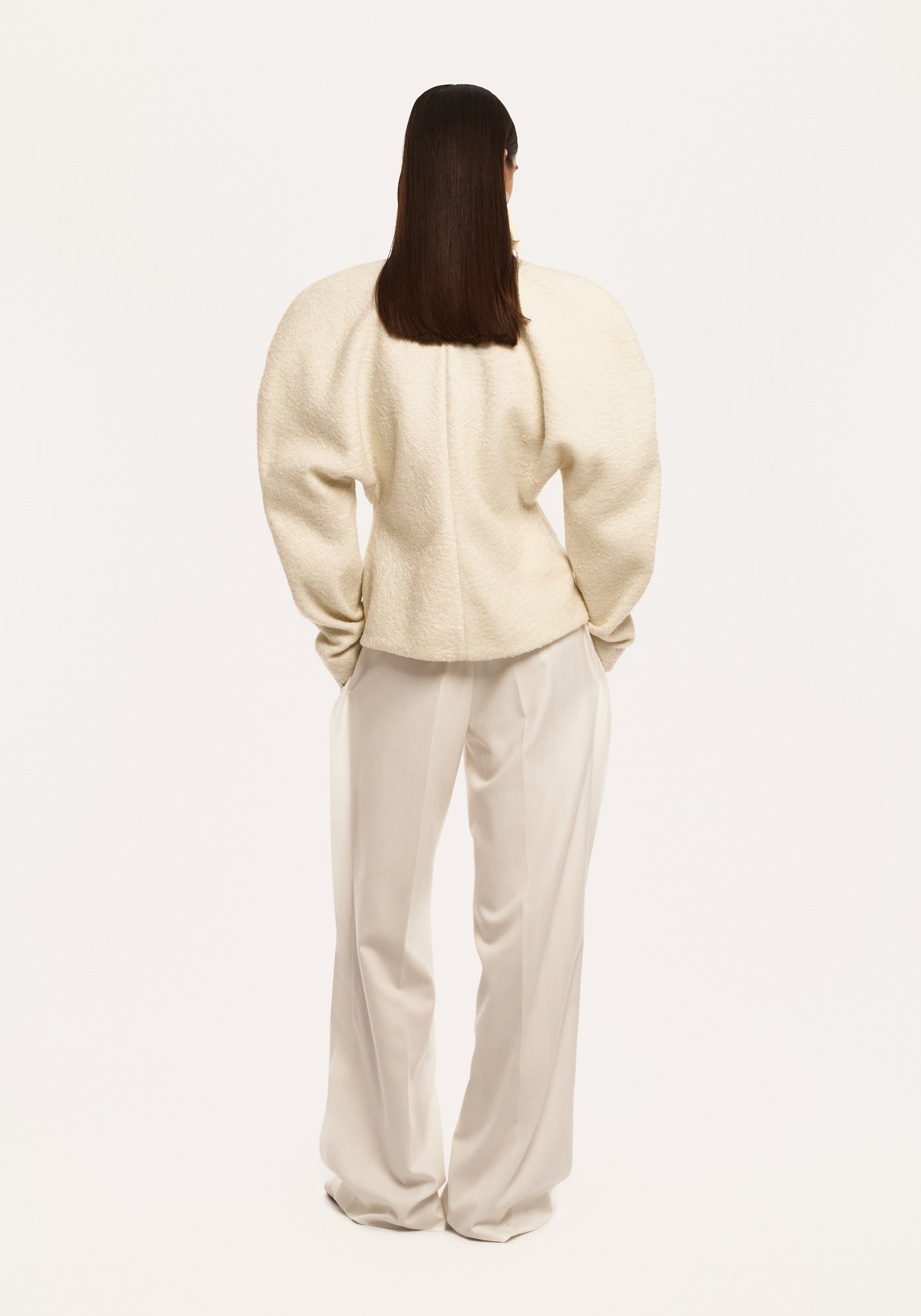 White trousers with raw seams