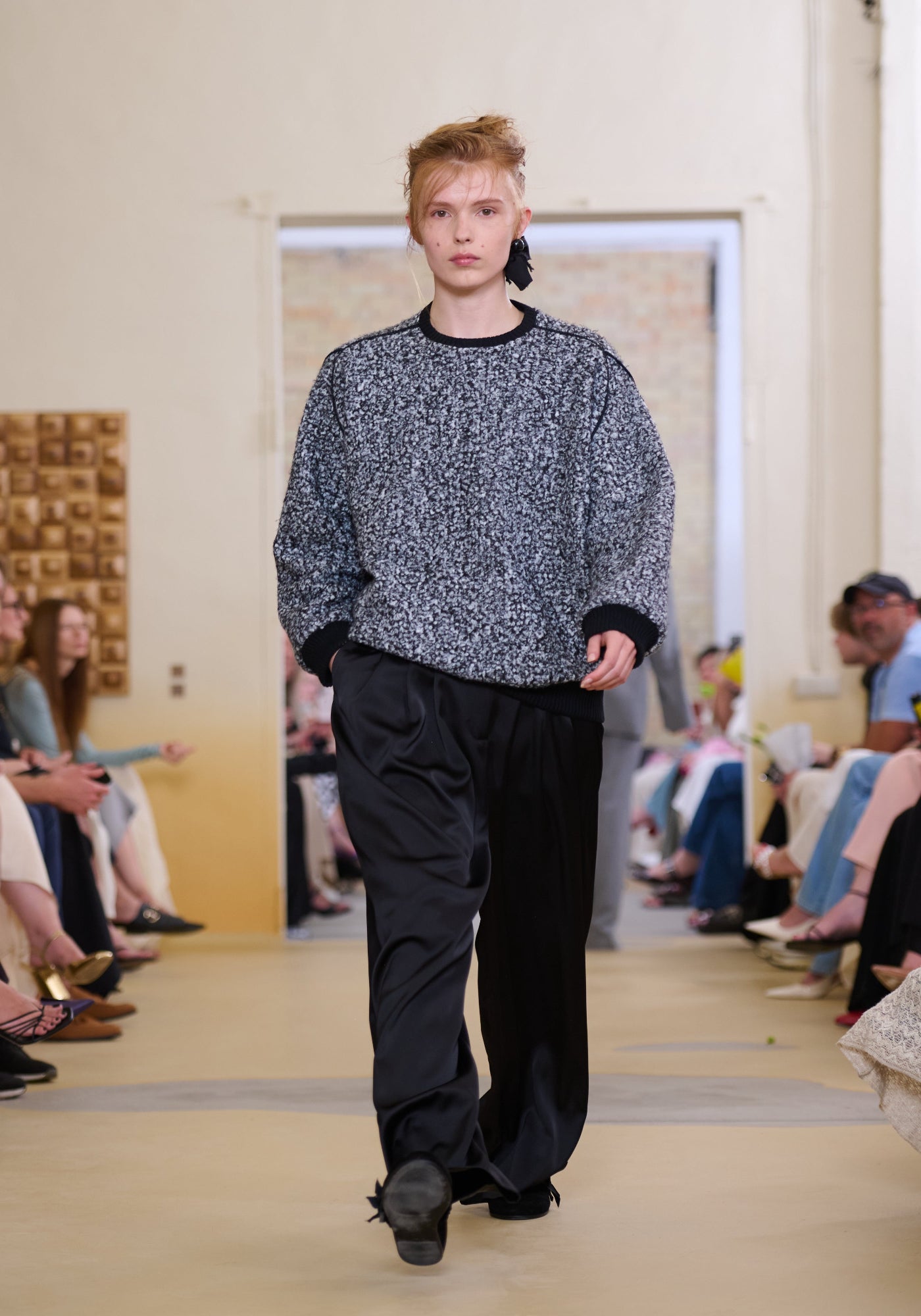 Black trousers with raw seams