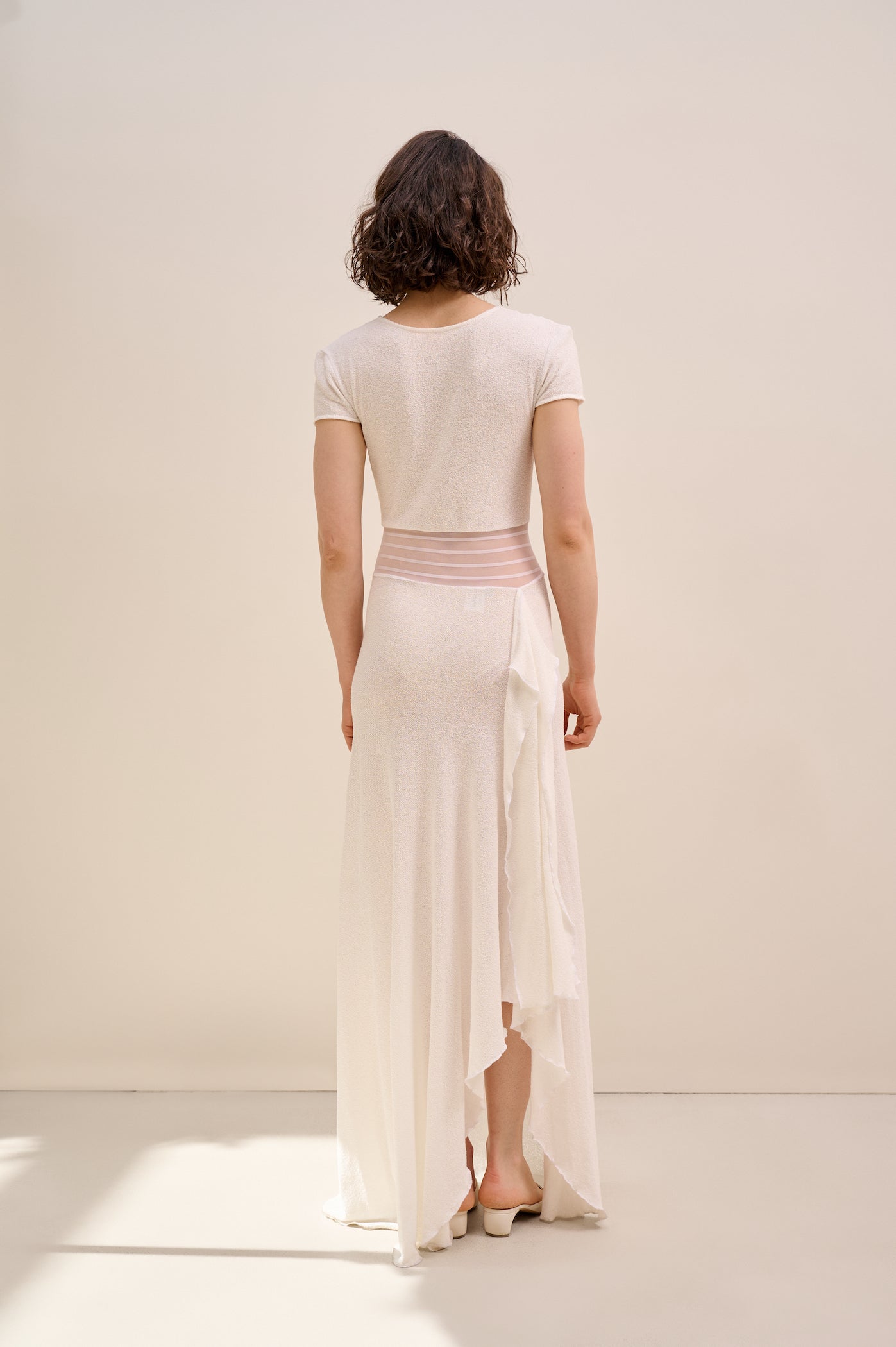 Knitted white dress with sheer ribbons