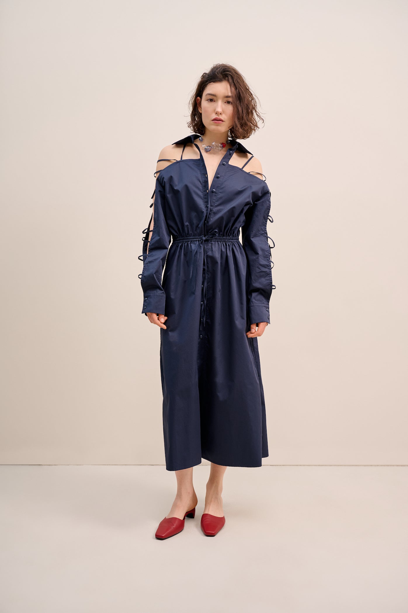 Dark blue shirt-dress with many straps