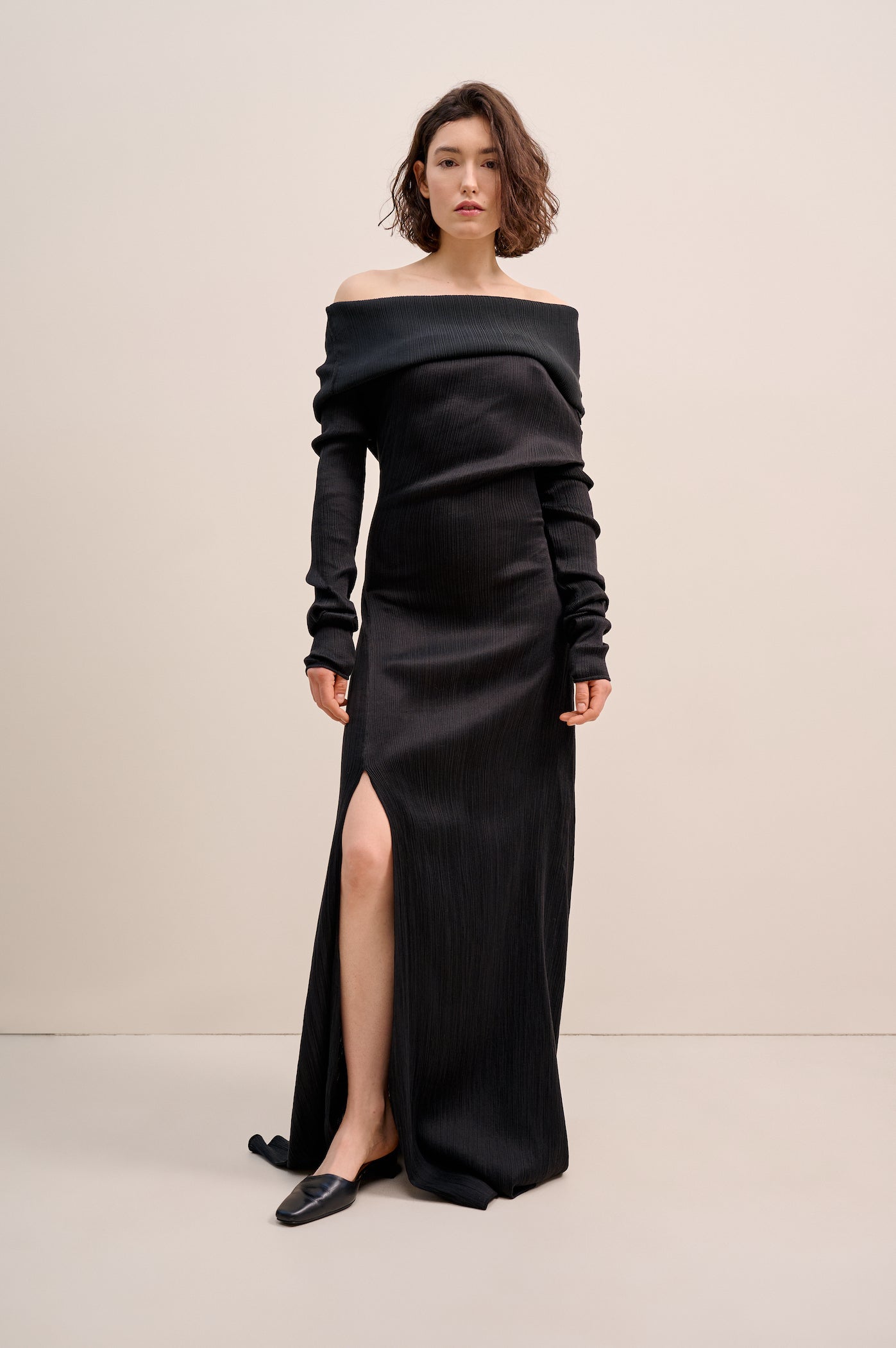 Black silk dress with bare shoulders