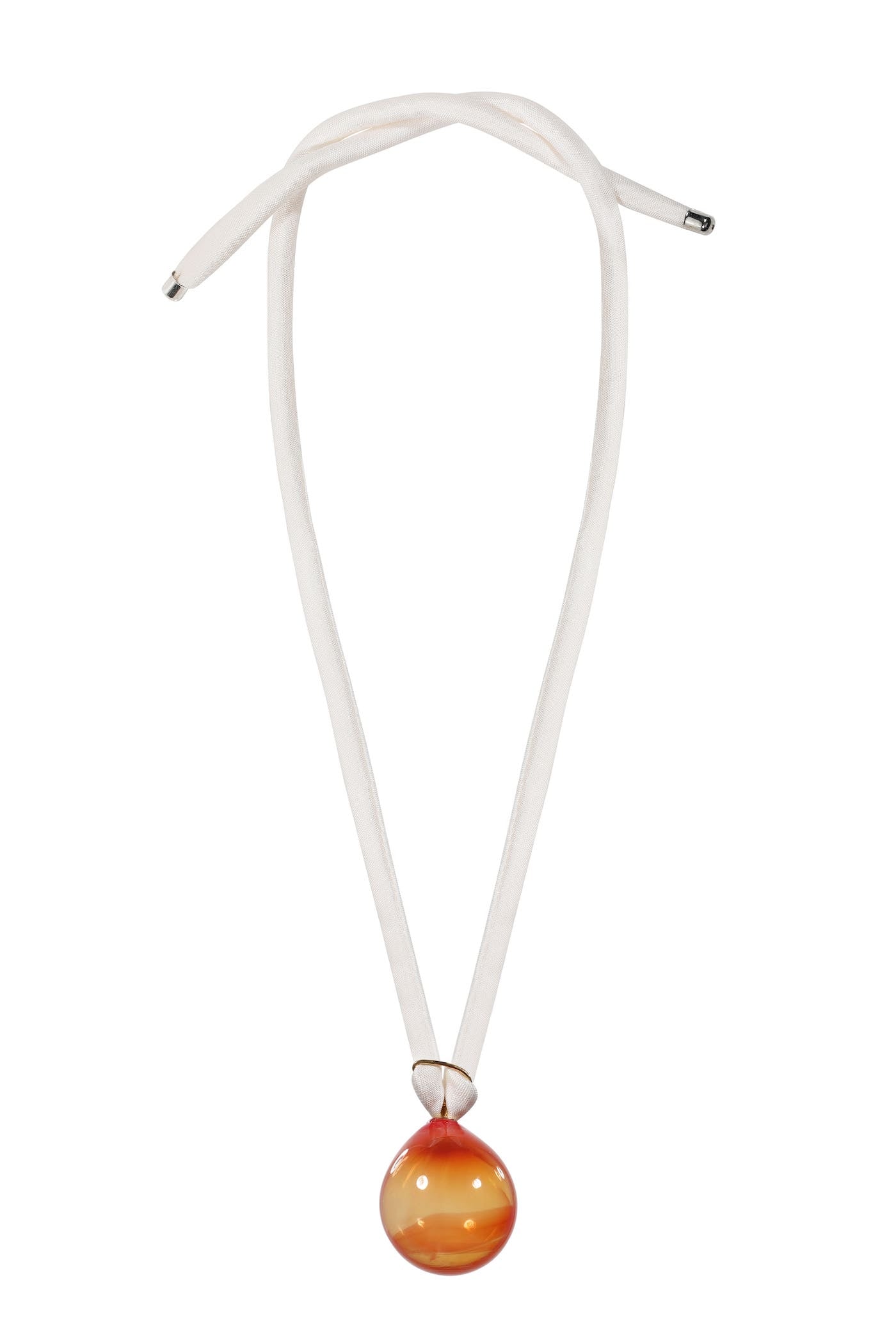 Pendant on the silk ribbon