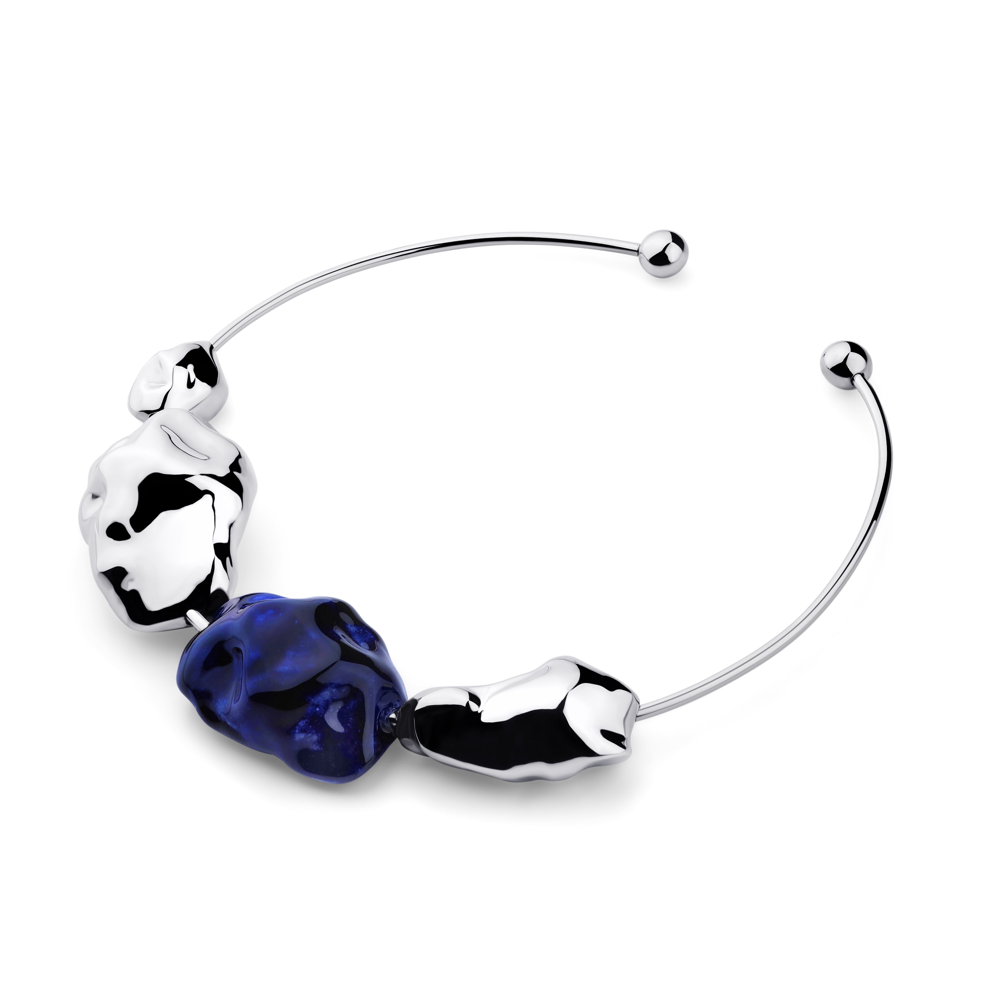 White gold necklace with blue bead